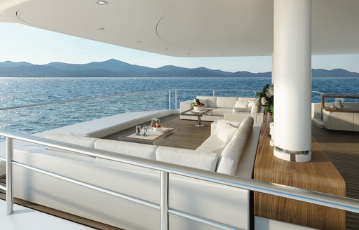 shaded al fresco seating area on board motor yacht SOLO