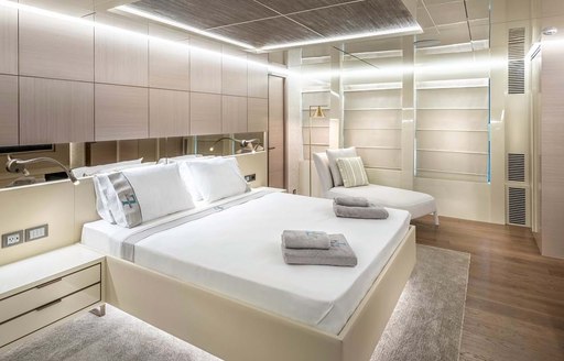 View of double bed on explorer yacht 'Seven Diamonds'