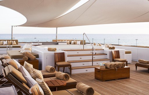 Superyacht Suri sun deck with jacuzzi and loungers