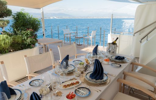 Super yacht charter RENEGADE alfresco dining setup