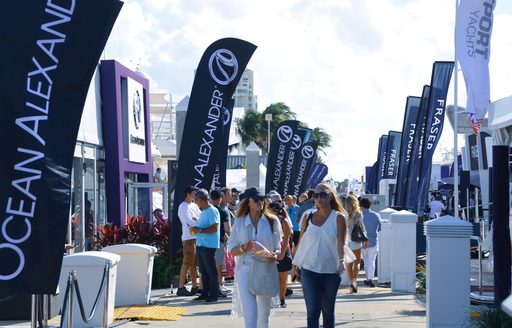 visitors stroll the boardwalks at FLIBS 2018