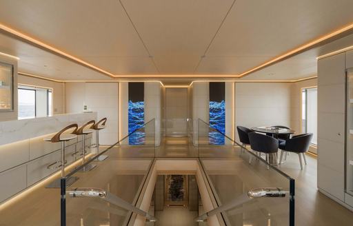 Charter yacht LASATA interiors with central staircase