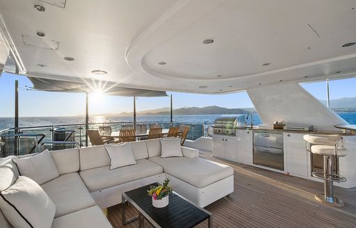 Charter yacht RULE NO.1 exterior shaded seating area