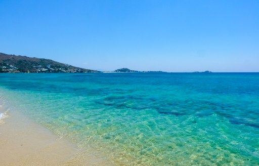 Clear water on plaka beach greece