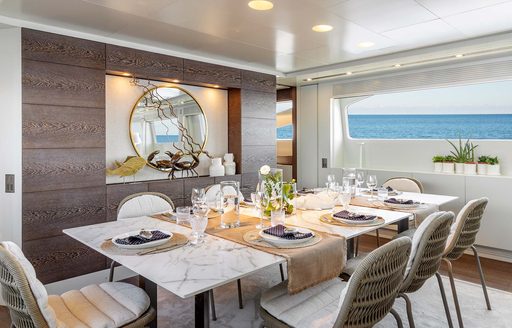 Charter yacht LA GIOCONDA interior dining table and large window