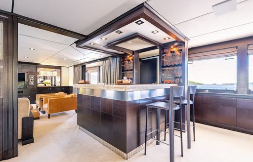 Charter yacht VICTORY interior bar and stools