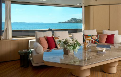 Charter yacht AZZURRI interior seating area and coffee table