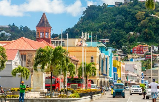 Overview of Kingstown in St Vincent & Grenadines, colored buildings line a busy street