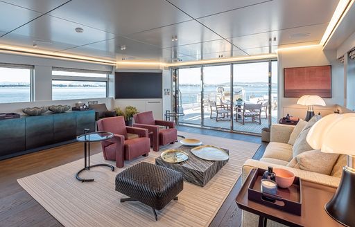 Charter yacht ONE ZERO upper salon with seating and large window