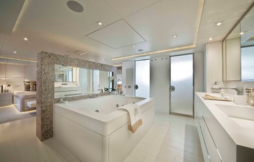 jacuzzi tub in the master suite of luxury yacht light holic