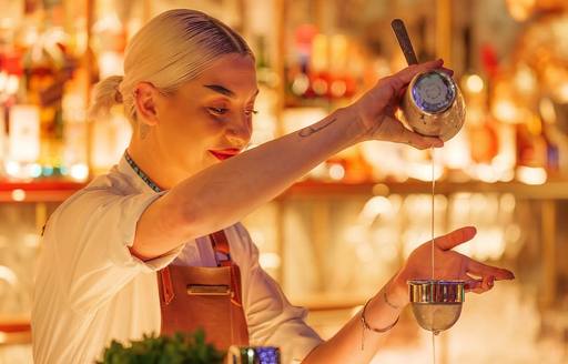 Bartender pouring cocktail
