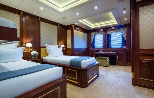 Twin cabin with two berths and two windows onboard charter yacht BLACK PEARL