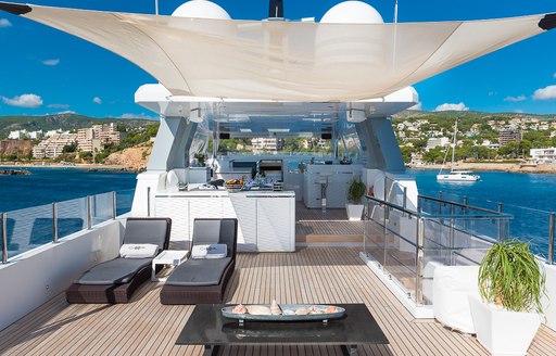 Sunlounging area covered by canva on motor yacht Cinquanta 50