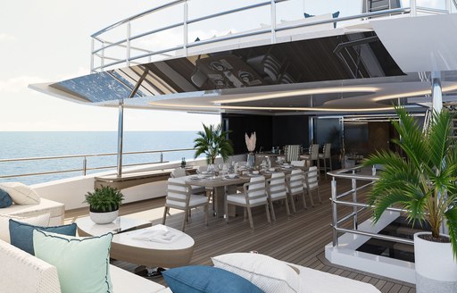 Alfresco dining option onboard superyacht charter ETERNAL SPARK, long table surrounded by striped upholstered chairs