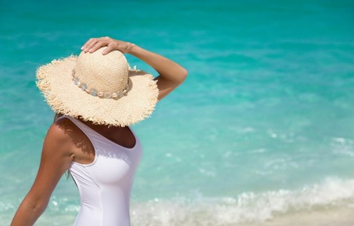 Charter guest enjoying the white sands of Xanadu Beach (Grand Bahama Island), Bahamas