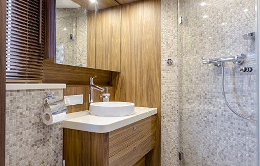 en suite bathroom forming part of the master suite on board luxury yacht Timeless 