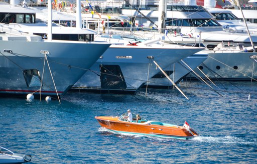 tender in the water at port hercules marina during monaco yacht show