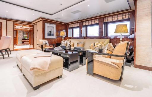 Charter yacht BATELLO interior lounge area with armchairs