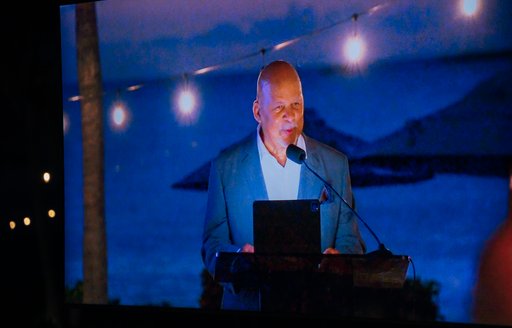 George Fraser presenting at podium