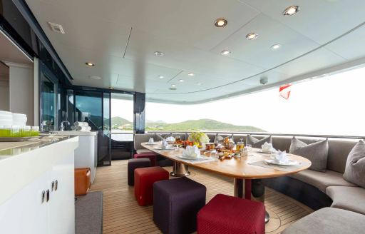 Exterior seating area onboard charter yacht BRAVADO