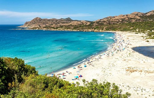 beach in french riviera, with white sand and blue sea