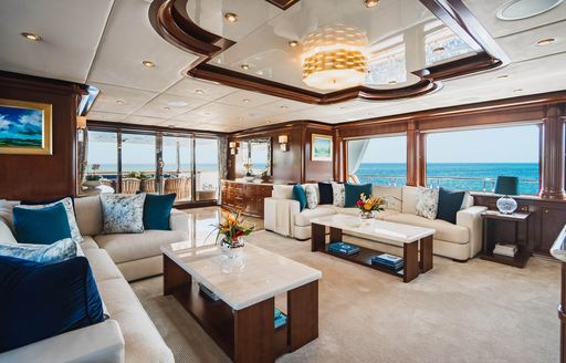 Charter yacht AQUASITION interior lounge with large windows
