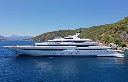 Charter yacht O'PARI at anchor in a bay