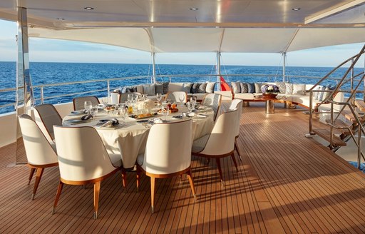 alfresco dining on the upper deck aft of motor yacht JOY 