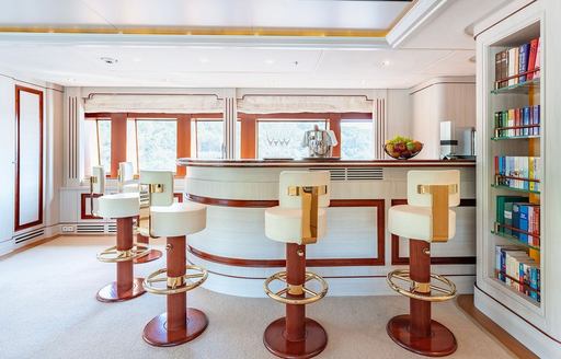 Charter yacht TIREA interior wet bar with stools