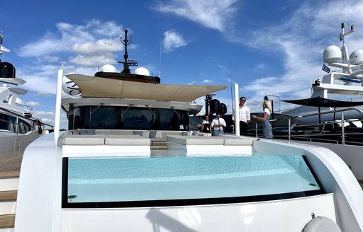 Overview of an infinity pool onboard a charter yacht