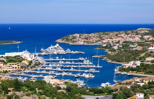 superyachts line up in Porto Cervo marina, Sardinia