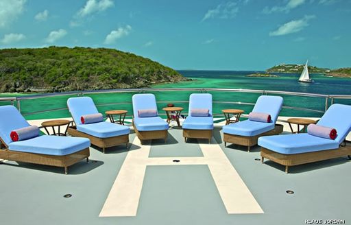 sun loungers lined up on helipad on superyacht ‘Northern Star’ 