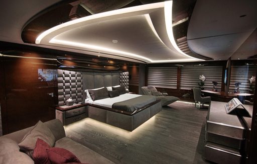 baba's yacht master suite with large bed and ceiling lighting