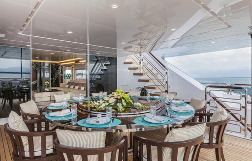 Alfresco dining area on the aft deck of charter yacht PARILLION