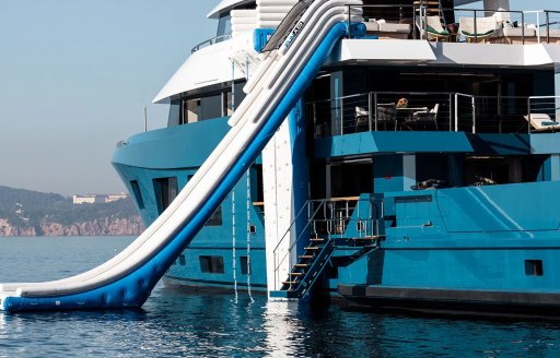 Water slide attached to charter yacht KING BENJI