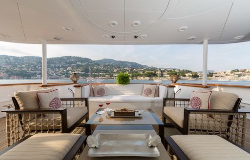 sophisticated alfresco lounge on aft deck of charter yacht BINA 