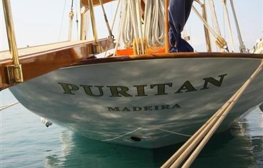 stern of sailing yacht PURITAN with name written