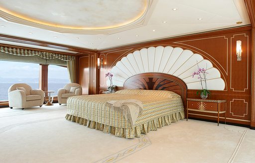 bed with art deco headboard on board luxury yacht ‘Lady Christine’ 