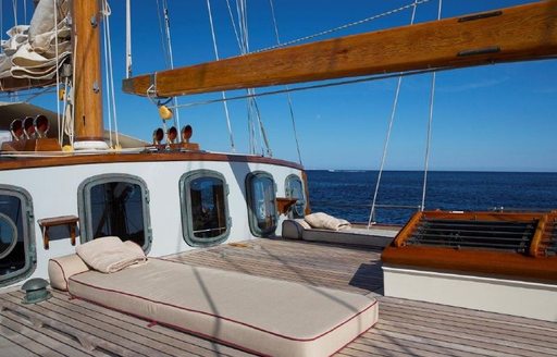 Sun pad on deck of charter yacht Silver Spray