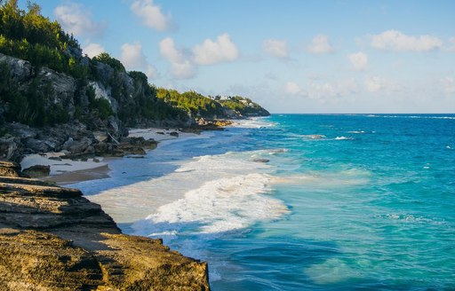 idyllic beach with white sand and blue water in Bermuda