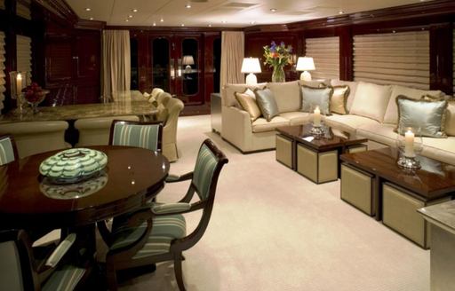 Sofas and table in sky lounge on board luxury yacht Lady Joy
