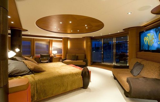 master suite on superyacht Sirocco ahowing bed facing large windows