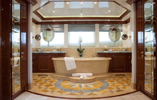 master suite on luxury yacht st david with mosaic tiled floors and grand bathtub