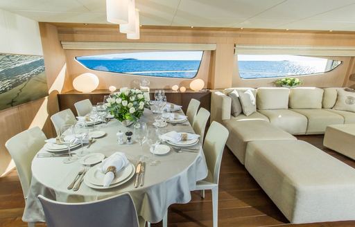 formal dining area in the main salon aboard motor yacht THEORIS 