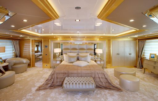 opulent master suite in cream and gold on board motor yacht ‘Lady Luck’ 