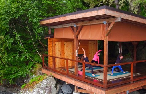 Women enjoying yoga on their vacation to Alaska Talon Lodge hotel and spa