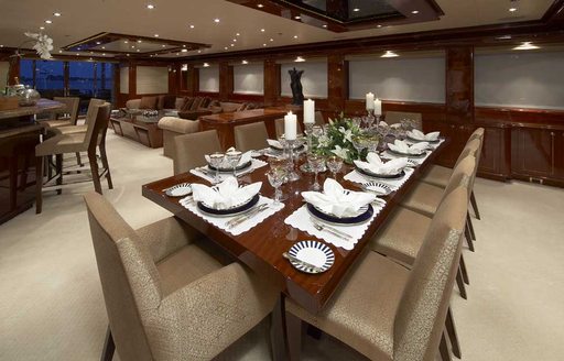 formal dining table in the main salon aboard luxury yacht Lady Leila 