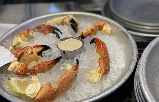 A bucket of crab claws on ice at the Fort Lauderdale Boat Show