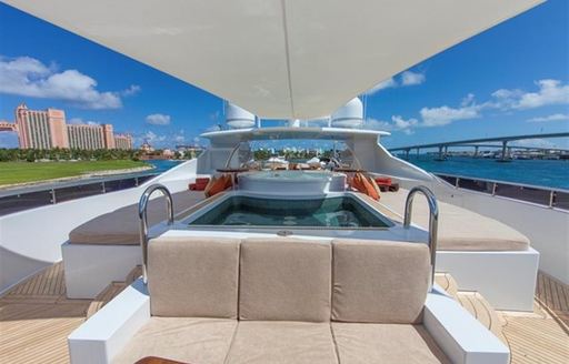 seating and jacuzzi on sundeck of motor yacht skyfall
