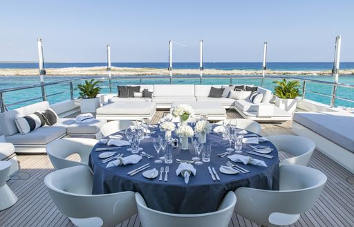 beautiful table setting onboard luxury charter yacht RoMa
